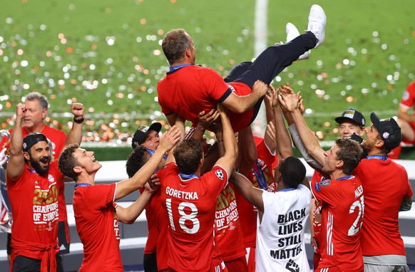 FOOTBALL : Paris Saint Germain vs Bayern Munich - Finale - UEFA Ligue des Champions - 23/08/2020 LISBON, PORTUGAL - AUGUST 23: Hans-Dieter Flick, Head Coach of FC Bayern Munich is thrown into the air  ...