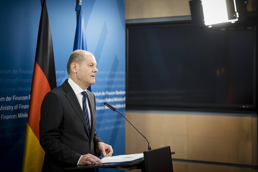 Bundesfinanzminister Olaf Scholz, SPD, gibt ein Doorstep-Statement vor der Sitzung der Eurogruppe, ECOFIN in Berlin. 15.03.2021. Berlin Deutschland *** German Finance Minister Olaf Scholz, SPD, gives  ...