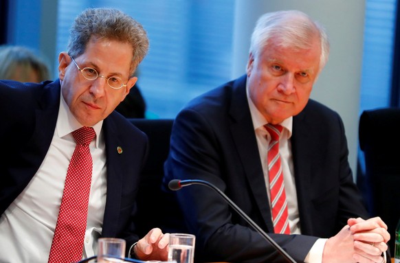 FILE PHOTO: Hans-Georg Maassen (L), President of the Federal Office for the Protection of the Constitution and German Interior Minister Horst Seehofer attend a parliamentary committee hearing of the l ...