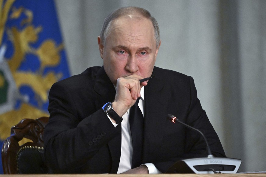 Russian President Vladimir Putin attends an expanded meeting of the Prosecutor General&#039;s Office board in Moscow, Russia, Tuesday, March 26, 2024. (Sergey Guneyev, Sputnik, Kremlin Pool Photo via  ...