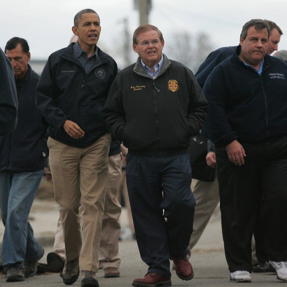 Syndication: USA TODAY President Barack Obama, Senator Bob Menendez and NJ Governor Chris Christie walked down East Shore Drive in Bergentine, N.J., where they met residents and surveyed damage done b ...