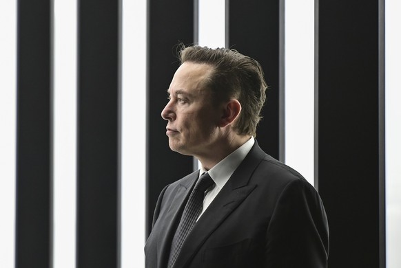 FILE - Elon Musk, Tesla CEO, attends the opening of the Tesla factory Berlin Brandenburg in Gruenheide, Germany, March 22, 2022. Musk said during a presentation Wednesday, Dec. 1, 2022, that his Neura ...