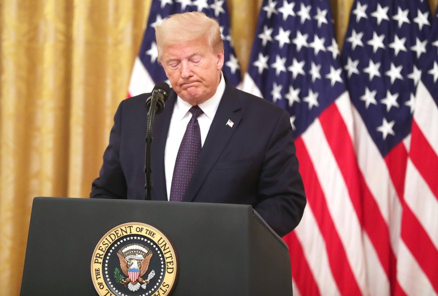 President Donald Trump participates in an event held to introduce a plan to help prevent suicide among U.S. veterans, in the East Room of the White House in Washington, DC on Wednesday, June 17, 2020. ...