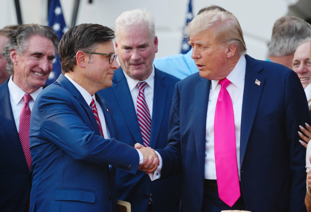 United States President Donald J Trump shakes hands with Speaker of the US House of Representatives Mike Johnson Republican of Louisiana, after signing his Big, Beautiful Bill, with new tax and immigr ...