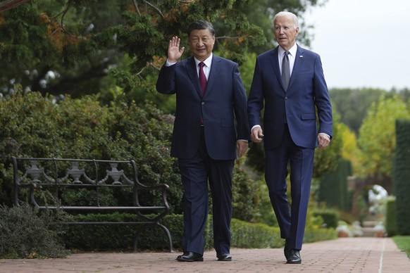 President Joe Biden and China&#039;s President President Xi Jinping walk in the gardens at the Filoli Estate in Woodside, Calif., Wednesday, Nov, 15, 2023, on the sidelines of the Asia-Pacific Economi ...