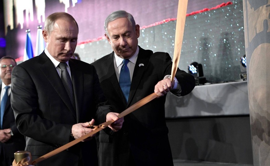 January 23, 2020. - Israel, Jerusalem. - Russia s President Vladimir Putin left and Israel s Prime Minister Benjamin Netanyahu at the opening of the Memorial Candle, a monument in Sacher Park commemor ...