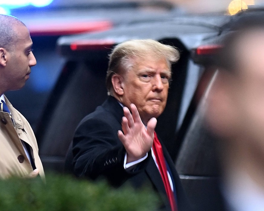 January 26, 2024, New York, New York, USA: Former President DONALD TRUMP leaves Trump Tower on Fifth Avenue on his way to Federal Court for the ongoing defamation trial brought by E.Jean Carroll in lo ...