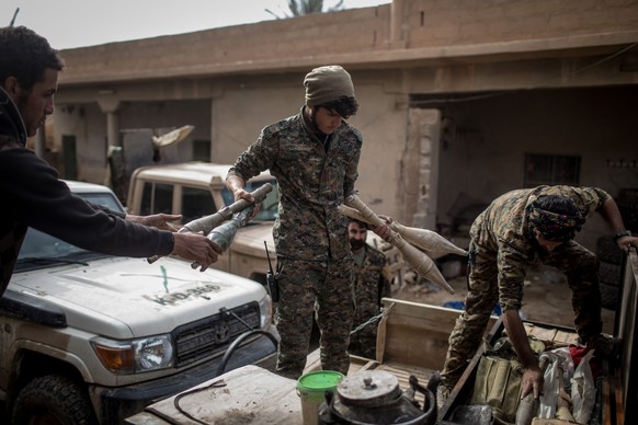 AS SUSAH, SYRIA - FEBRUARY 16: SDF fighters prepare equipment at a base on February 16, 2019 in As Susah, Syria. Civilians have begun returning to some small towns close to Bagouz that were recently l ...