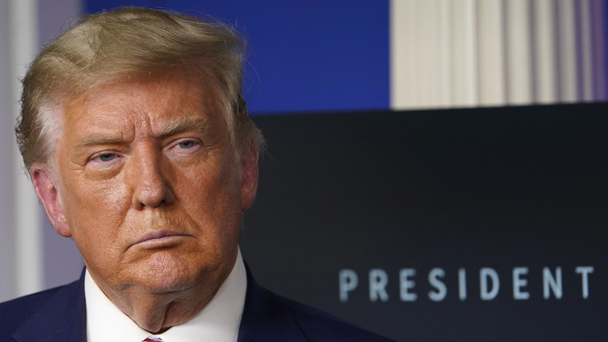 FILE - In this Friday, Nov. 20, 2020, file photo, President Donald Trump listens during an event in the briefing room of the White House in Washington. For the past four years, Trump has enjoyed speci ...