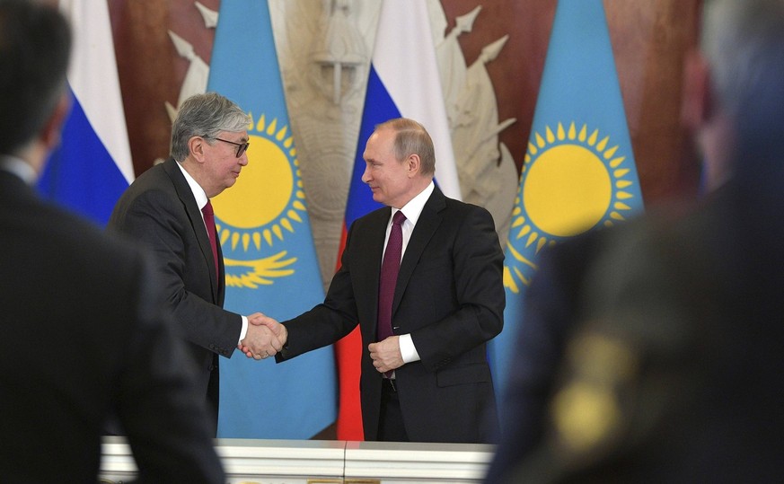 April 3, 2019 - Moscow, Russia - Russian President Vladimir Putin, right, shakes hands with Kazakh interim President Kassym-Jomart Tokayev during a signing ceremony following bilateral discussions at  ...