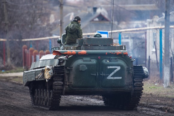 UKRAINE - MARCH 6, 2022: Military hardware in the Ukrainian village of Bugas recently taken under control by the Donetsk People s Republic troops. Tension began to escalate in Donbass on 17 February,  ...