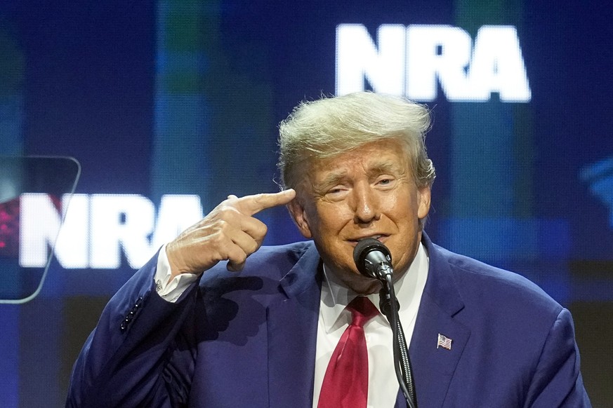 Former President Donald Trump speaks during the National Rifle Association Convention, Friday, April 14, 2023, in Indianapolis. (AP Photo/Darron Cummings)