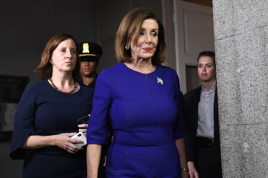 House Speaker Nancy Pelosi of Calif., heads to a meeting with her caucus on Capitol Hill in Washington, Tuesday, Sept. 24, 2019. (AP Photo/Susan Walsh)