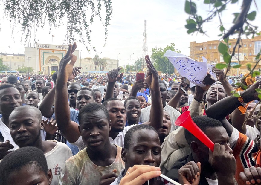 Supporters of mutinous soldiers demonstrate in Niamey, Niger, Thursday July 27 2023. Governing bodies in Africa condemned what they characterized as a coup attempt Wednesday against Niger&#039;s Presi ...