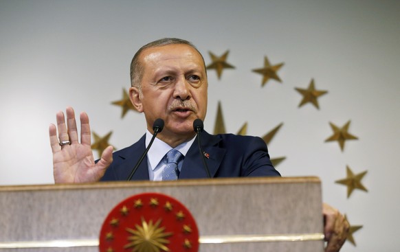 Turkey's President Recep Tayyip Erdogan delivers a statement on national television from his official residence in Istanbul, Sunday, June 24, 2018. Erdogan was proclaimed the winner early Monday of a ...