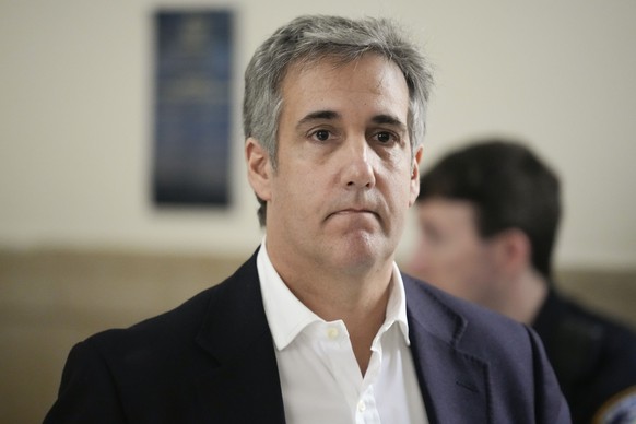 Michael Cohen returns to the courtroom after a break in proceedings at New York Supreme Court, Wednesday, Oct. 25, 2023, in New York. Cohen is back on the witness stand to testify against his ex-boss  ...
