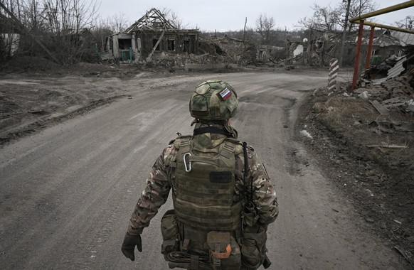 Russia Ukraine Military Operation Avdiivka Demining 8649196 22.03.2024 A sapper of the Centre group of forces inspects an area for explosive devices amid Russia s military operation in Ukraine, in the ...