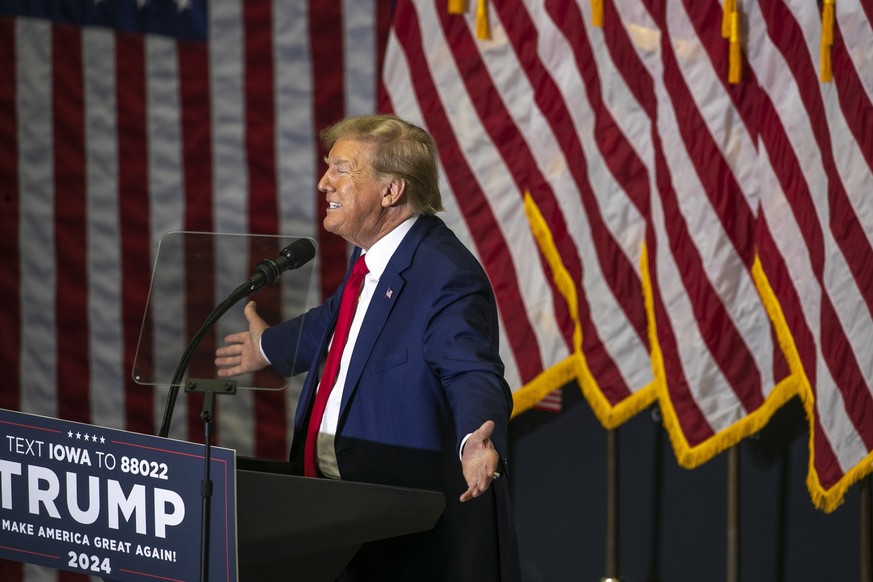 Republican presidential candidate and former President Donald Trump speaks to the crowd during a caucus event, Saturday, Dec. 2, 2023, at Kirkwood Community College in Cedar Rapids, Iowa. (Geoff Stell ...