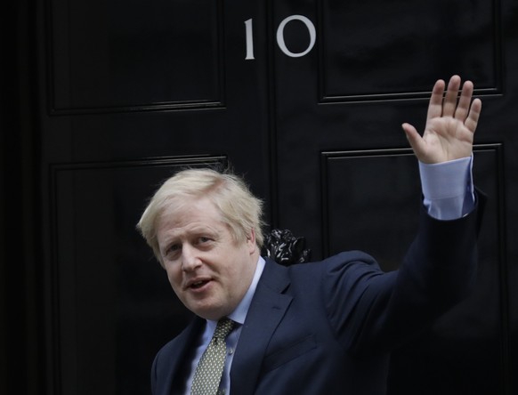 FILE - Britain's Prime Minister Boris Johnson returns to 10 Downing Street after meeting with Queen Elizabeth II at Buckingham Palace, London, Dec. 13, 2019. Boris Johnson’s bluster couldn’t hide the  ...
