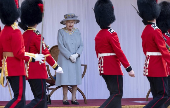 PAP06122378 Queen Elizabeth II attends a military ceremony in the Quadrangle of Windsor Castle to mark her Official Birthday on June 12, 2021 in Windsor, England. Trooping of the Colour has marked the ...