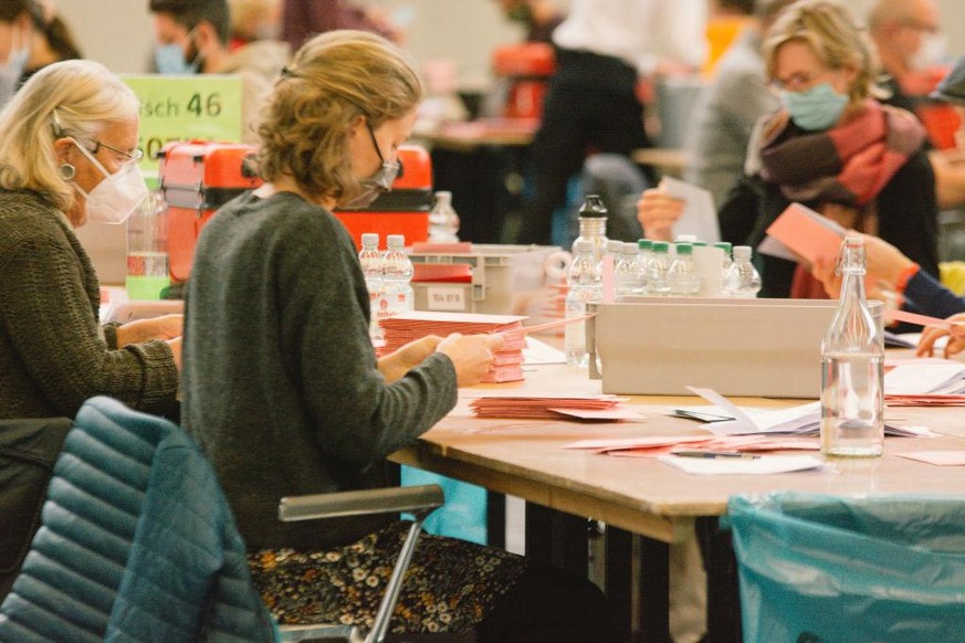 General view of election helpers counting of the votes while wearing face mask at the second round of Cologne mayoral election on September 27, 2020 in Cologne, Germany. (Photo by Ying Tang/NurPhoto v ...