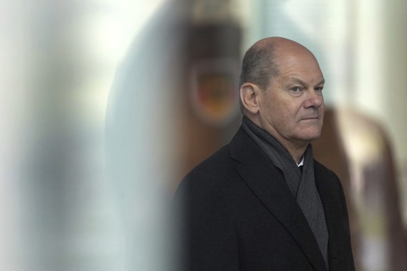 German Chancellor Olaf Scholz waits for the arrival of the Prime Minister of Italy, Giorgia Meloni, at the chancellery in Berlin, Germany, Friday, Feb. 3, 2023. (AP Photo/Michael Sohn)