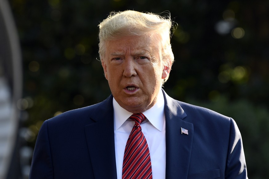 President Donald Trump talks with reporters before leaving on Marine One on the South Lawn of the White House in Washington, Sunday, Sept. 22, 2019. Trump is traveling to Texas and Ohio before heading ...