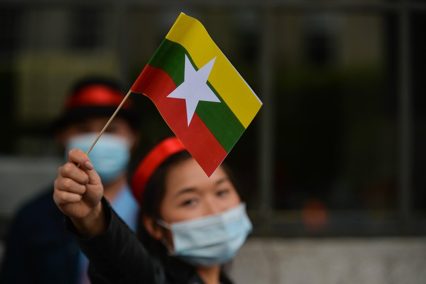 Global Spring Revolution For Myanmar Rally In Dublin A member of the local Myanmar Burmese diaspora holding a national flag of Myanmar seen in front of the GPO in Dublin at a pro-democracy rally calle ...