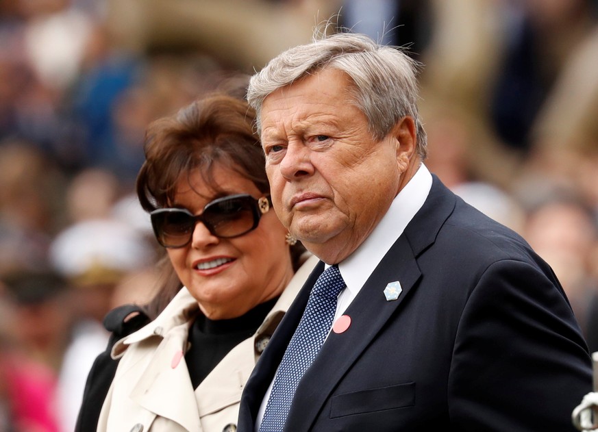 FILE PHOTO: The parents of U.S. first lady Melania Trump, Viktor and Amalija Knavs, await the start of the official arrival ceremony held by U.S. President Donald Trump and Mrs. Trump for French Presi ...