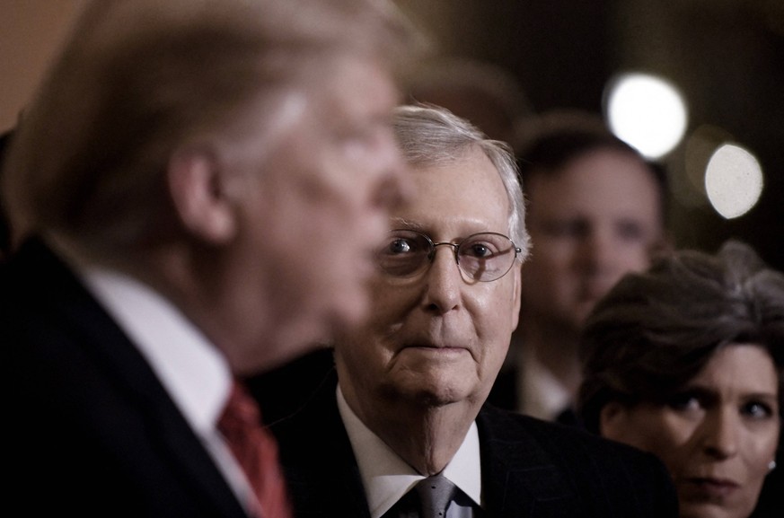 Trump Attacks Dour Leader McConnell File photo dated January 9, 2019 of US President Donald Trump L talks to the press as Senate Majority Leader Mitch McConnell R-KY looks on after the Republican lunc ...