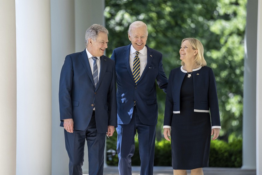 May 19, 2022, Washington, DC, United States of America: U.S President Joe Biden, center, walks along the Colonnade with Swedish Prime Minister Magdalena Andersson, right, and Finnish President Sauli N ...