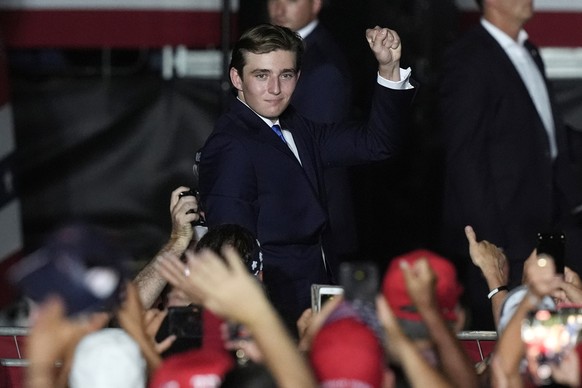 Barron Trump gestures after his father Republican presidential candidate former President Donald Trump introduced him during a campaign rally at Trump National Doral Miami, Tuesday, July 9, 2024, in D ...