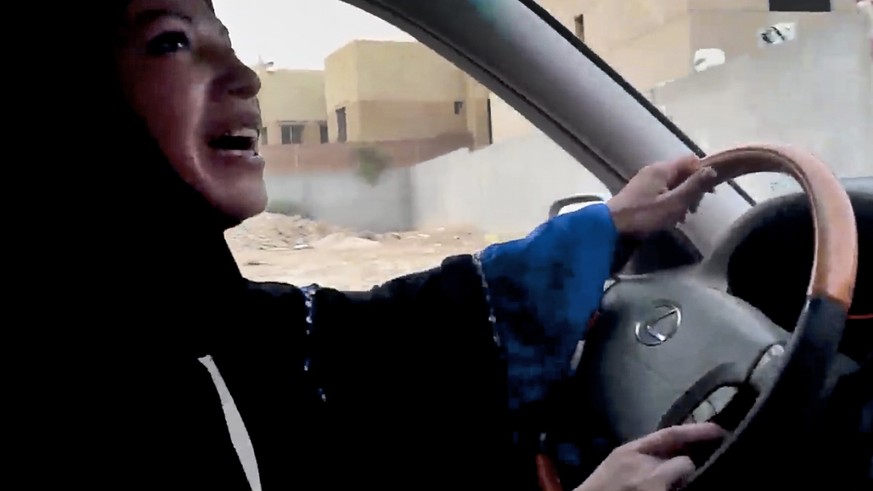 FILE - In this Friday, June 17, 2011 file image made from video released by Change.org, a Saudi Arabian woman drives a car as part of a campaign to defy Saudi Arabia's ban on women driving, in Riyadh, ...