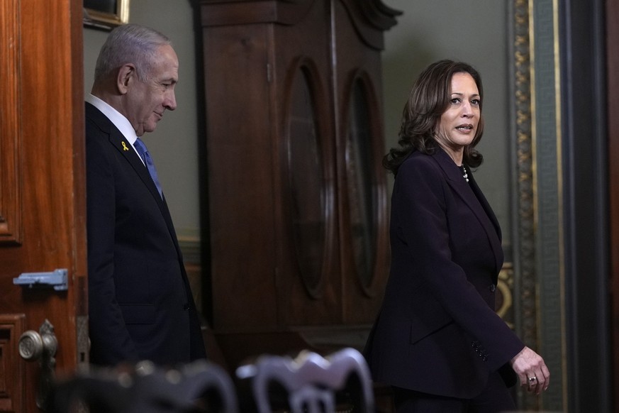 FILE - Vice President Kamala Harris, right, and Israeli Prime Minister Benjamin Netanyahu arrive before a meeting at the Eisenhower Executive Office Building on the White House complex in Washington,  ...