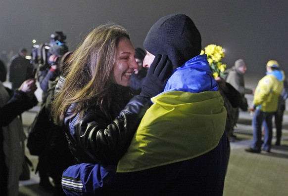 December 28, 2017 - Kiev, Ukraine - Relatives and friends meet the released Ukrainian hostages at the airport of Boryspil, Ukraine, on 27 December 2017. The Ukrainian side swapped 306 imprisoned milit ...