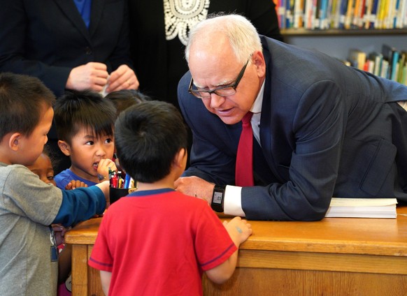 May 30, 2019 - St. Paul, MN, USA - Under the watchful eye of Pre-K children from Bruce Vento Elementary School in St. Paul, Governor Tim Walz signed the school funding bill into law, and announced his ...