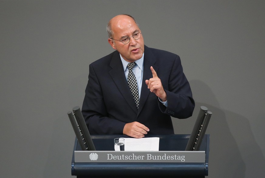 BERLIN, GERMANY - SEPTEMBER 01: Gregor Gysi, co-leader of the Bundestag faction of Die Linke left-wing party, speaks at the Bundestag during debates following a government declaration given by German  ...