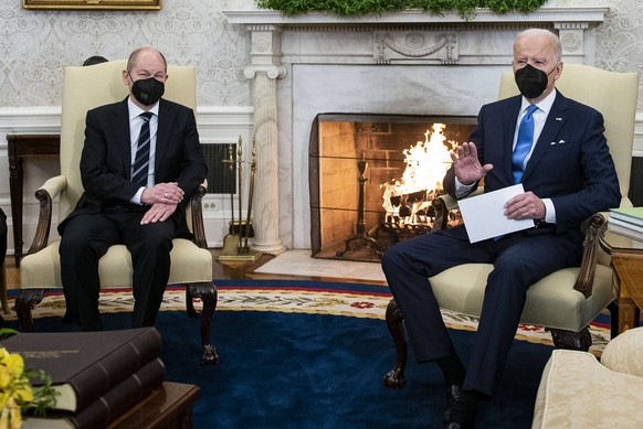 United States President Joe Biden, right, meets with Chancellor Olaf Scholz of Germany, left, in the Oval Office of the White House in Washington, DC, on Monday, February 7, 2022. PUBLICATIONxNOTxINxU ...