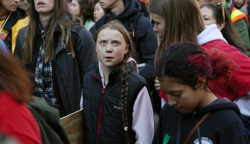 Swedish teen activist Greta Thunberg arrives for the post federal election Friday climate strike march starting and ending at the Vancouver Art Gallery in Vancouver, British Columbia on Friday, Octobe ...