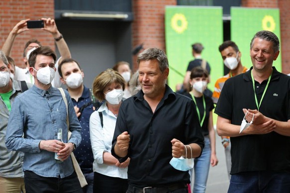 BERLIN, GERMANY - JUNE 12: Robert Habeck, co-leader of the German Greens Party, chats with new Greens Party members who arrived to attend the Greens Party virtual federal party congress in person on J ...