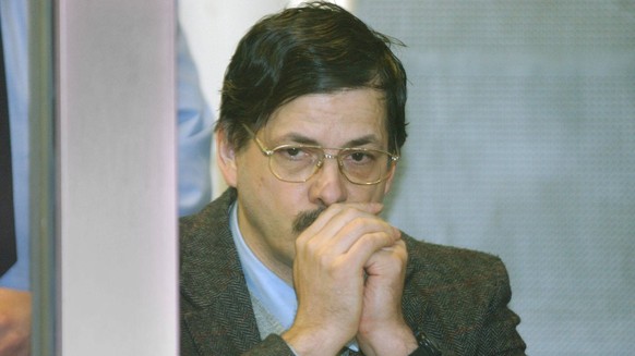 BRU13 - - ARLON, BELGIUM : Accused Marc Dutroux sits in his box, Thursday 22 April 2004, during a new session of the trial of Belgian paedophile Marc Dutroux and his accomplices Michelle Martin, Miche ...
