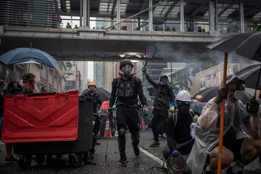 HONG KONG, CHINA - AUGUST 25: Protesters clash with police after an anti-government rally in Tsuen Wan district on August 25, 2019 in Hong Kong, China. Pro-democracy protesters have continued rallies  ...