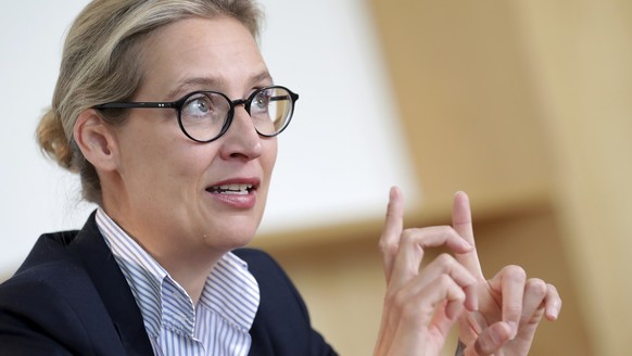 In this Tuesday, May 7, 2019 photo Alice Weidel, co-faction leader of the Alternative for Germany party (AfD) at the German federal parliament, Bundestag, attends an AP interview in Berlin, Germany. ( ...
