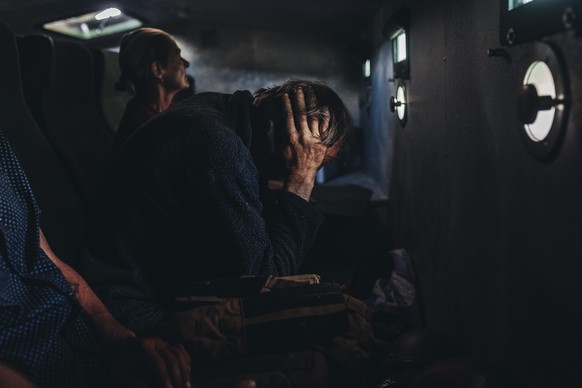 LUHANSK, UKRAINE - JUNE 8: A resident is evacuated in an armoured car in Lisichansk, Luhansk Oblast, Ukraine, on June 8, 2022. Diego Herrera Carcedo / Anadolu Agency