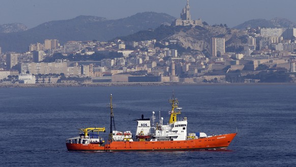 The French NGO &quot;SOS Mediterranee&quot; Aquarius ship leaves the Marseille harbor, southern France, Wednesday, Aug. 1, 2018. In prolonged stopping for a month, Aquarius is heading back to the Cent ...