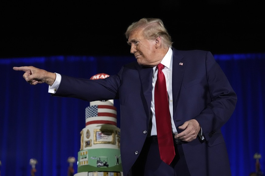 Republican presidential candidate former President Donald Trump gestures after speaking at his birthday celebration, hosted by Club 47, in West Palm Beach, Fla., Friday, June 14, 2024. (AP Photo/Geral ...