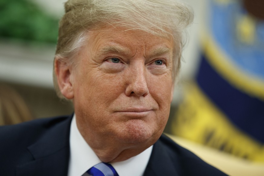 President Donald Trump smiles during a meeting with the Emir of Kuwait Sheikh Sabah Al Ahmad Al Sabah in the Oval Office of the White House, Wednesday, Sept. 5, 2018, in Washington. (AP Photo/Evan Vuc ...