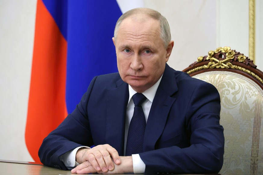 Russian President Vladimir Putin makes a video address to participants of the 2nd National Healthcare Congress at the Kremlin in Moscow, Russia, Friday, Dec. 1, 2023. (Mikhail Klimentyev, Sputnik, Kre ...