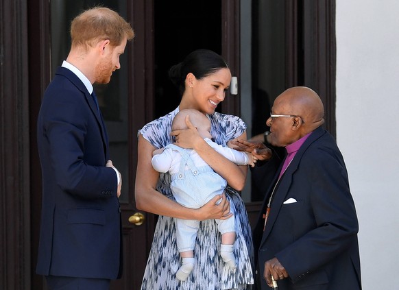 Britain s Prince Harry and Meghan visit South Africa Britain s Prince Harry and his wife Meghan, Duchess of Sussex, holding their son Archie, meet Archbishop Desmond Tutu at the Desmond &amp; Leah Tut ...