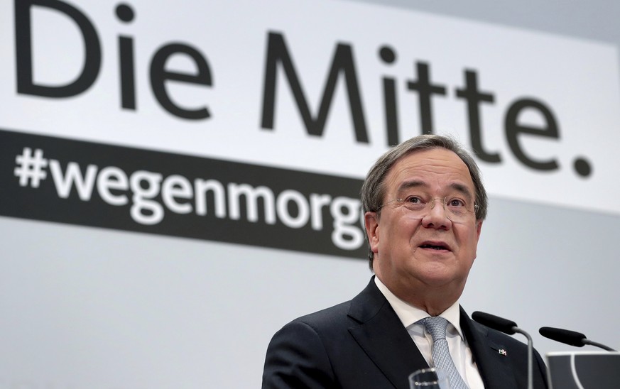 Armin Laschet, chairman of the German Christian Democratic Union, CDU, addresses the media during a press conference at the party&#039;s headquarters in Berlin, Germany, Monday, Jan. 25, 2021. Slogan  ...